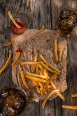 French fries on a old wooden table