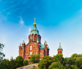 Fototapeta na wymiar Helsinki, Finland. Uspenski Cathedral On Hill At Summer Sunny Day