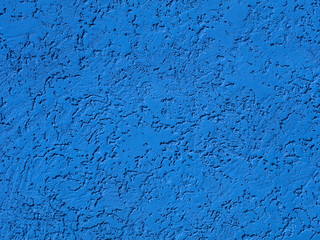 Blue plaster on wall, plasterwork, sand texture