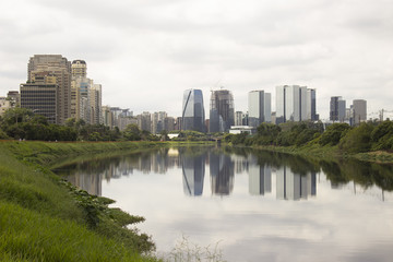 Fototapeta na wymiar Marginal Pinheiros, Pinheiros river, Estaiada bridge - Sao Paulo, Brazil