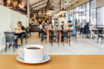 cup of coffee on coffee shop background.