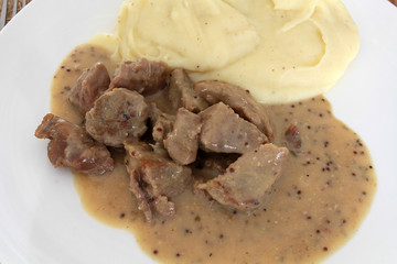 sauté de porc à la moutarde et purée