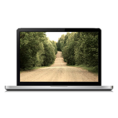 Laptop with country road on screen
