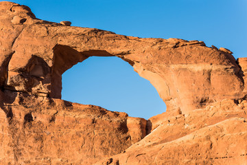 Canyons at Arches National Park with Skyline Arch closeup during sunset