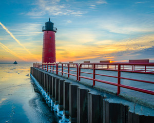  Red light house on Lake Michigan in Milwaukee at sunrise 