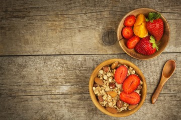 Oatmeal with strawberries. The concept of healthy eating. An exquisite snack for athletes. Vegetarian food.