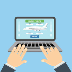Flight ticket search. Hands typing on laptop for online booking.