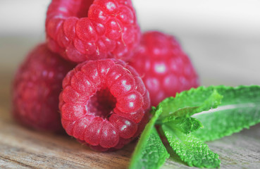 Raspberry fruit on wooden Background