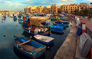 Fototapeta na wymiar Maltese boats. The port of Birzebbuga.