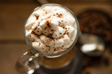Glass of cup coffee with cream 
