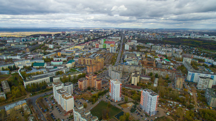 Fototapeta premium Typical city of Russia at sunset in center. Aerial view