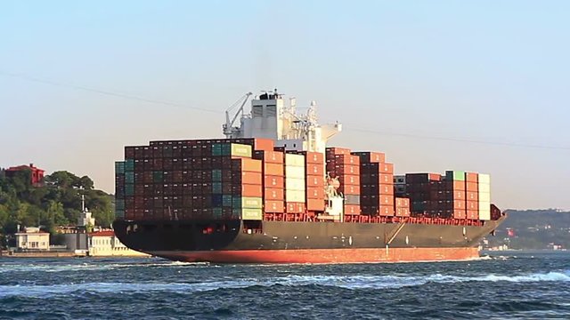 Cargo ship full of containers sailing from Black Sea. Container Transportation. 