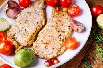 Fried pork meat and vegetables 