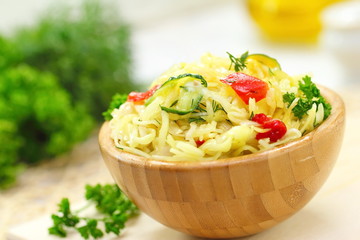 Salad with pickled cabbage, cucumbers, paprika and olive oil