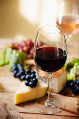 Glass of wine, grape and chesse 