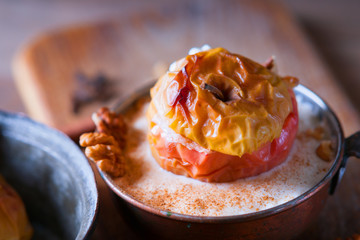 Fruit dessert baked apples in the pan 
