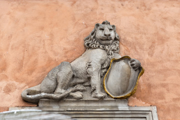 Lion bas relief on the building wall in Warsaw, Poland.