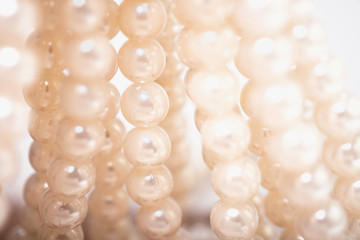 Bead necklace / View of plastic white bead necklace. Selective focus.