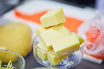 Ingredients cheese cubes in the kitchen