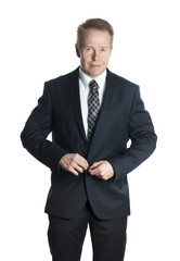 Middle-aged businessman in suit isolated on white background