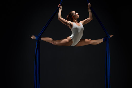 Sexy Girl In White Body On Aerial Silks