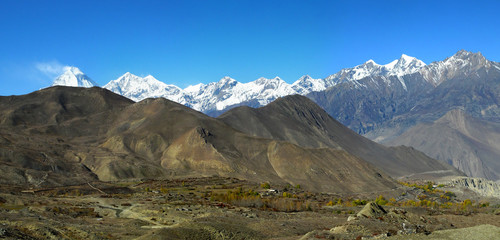 Panoramic veiw of the Himalayan Mountains and Dhaulagiri mount after Thorong La pass, Muktinath, Nepal.