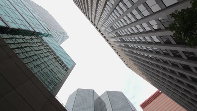 Low-Angle View Of City Buildings With 180 Degree Camera Rotation HD