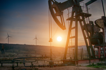 oil pump on sunset