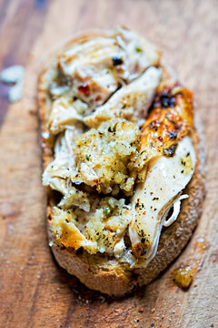 Torn Roasted Chicken With Stuffing On Toasted Sourdough Bread 