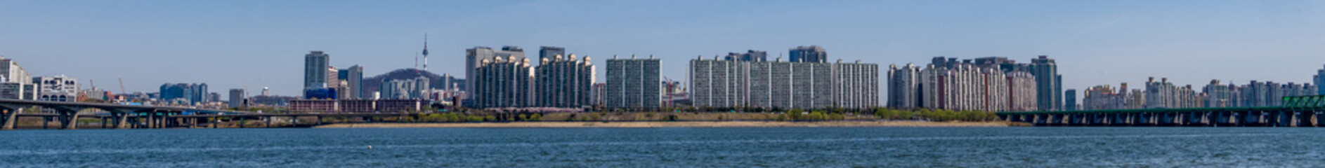 Panorama of a portion of the skyline of Seoul, South Korea with the Han River