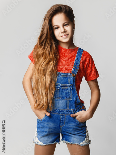 Cute Teen Girl Smiling Studio Portrait Of A Teenage Girl In Jeans And A T Cute Teen Girl Smiling Studio Portrait Of A Teenage Girl In Jeans And A T