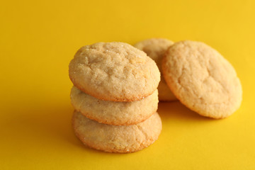 Sugar cookies on yellow background