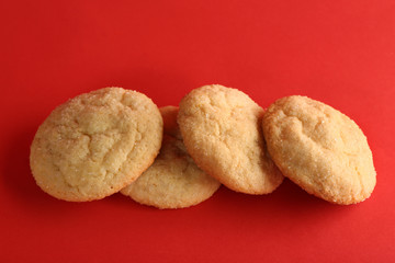 Sugar cookies on red background