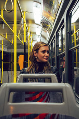 Brunette alone in tram © Alen Ajan