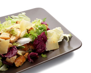 Plate with chicken salad on white background