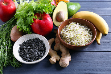 Set of healthy products on wooden background