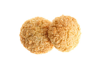 Delicious coconut cookies on white background