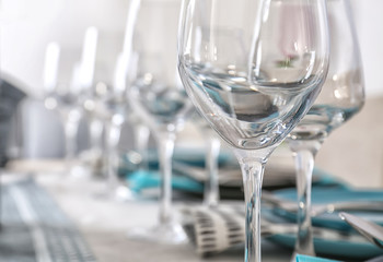 Empty glass on table in restaurant, closeup