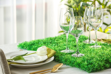 Table with beautiful setting in restaurant, closeup
