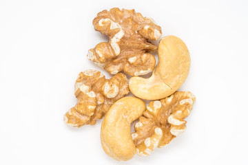 walnuts and cashew nuts isolated on white