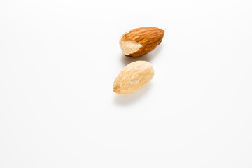 peeled almond isolated on white