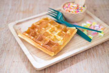 Waffle with topped fruit jelly candy and sugar sprinkle dots
