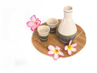 sake bottle and cup with white background