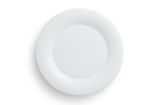 Empty white round plate on white background, clipping path included.