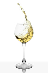 Splash of white wine in the cup filling on a white background