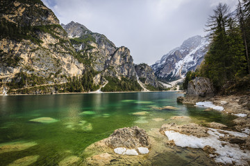 Fototapeta na wymiar Spring view at Lago Braies, Pragser See Dolomites, Lake mountain landcape with Alps peak reflection , Italy