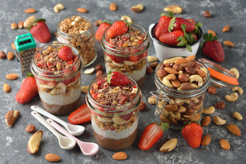 Dietary dessert with chia seeds, muesli and strawberries