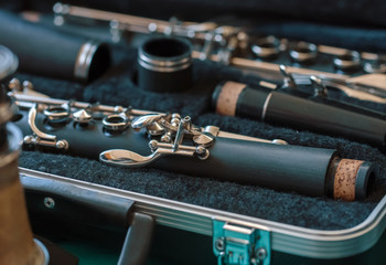 Naklejka premium macro old clarinet in bag on counter in bazaar