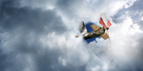 Fototapeta na wymiar air plane flying on blue sky white clouds background.