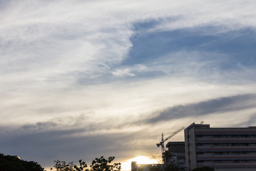 soft white clouds against blue sky background.